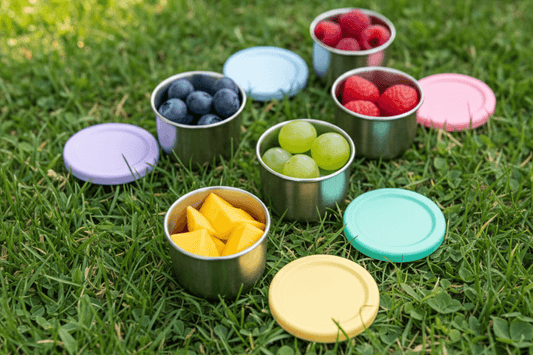 Stainless Steel Snack Pots with fresh Fruit on Grass