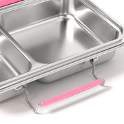 Pink silicone replacement latch fitted to the side of a stainless steel bento box
