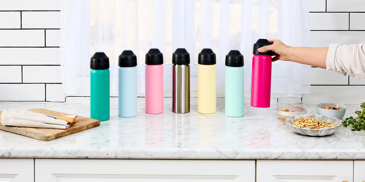 colourful insulated stainless steel drink bottles on kitchen bench