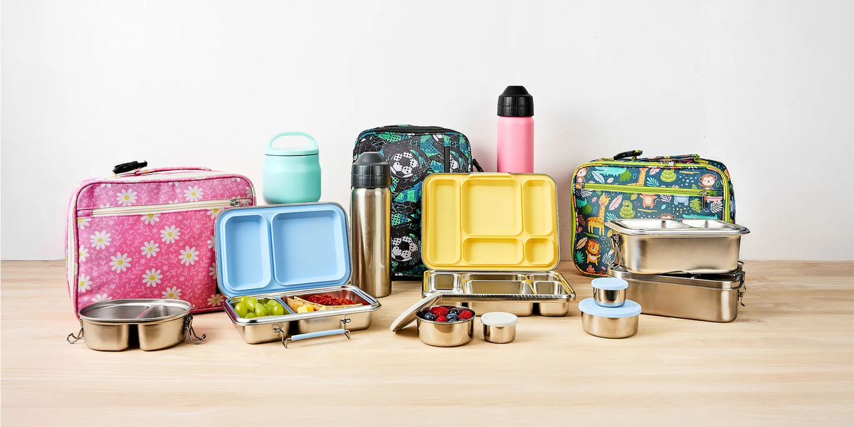 colourful lunchboxes and lunchbags with studio background